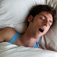 https://www.devinburke.com/wp-content/uploads/2019/02/Man-sleeping-and-snoring-overhead-view-2367811.jpg